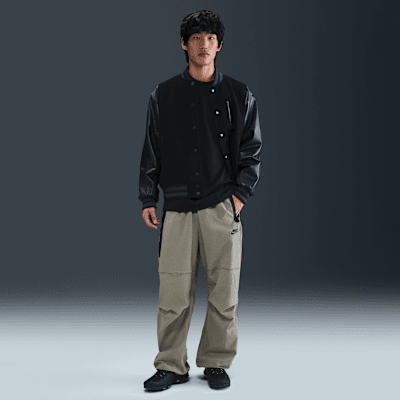 NIKE アーモリーネイビー　オープンヘムパンツ NIKE（ナイキ）の「ナイキ テック メンズ フリース オープンヘム